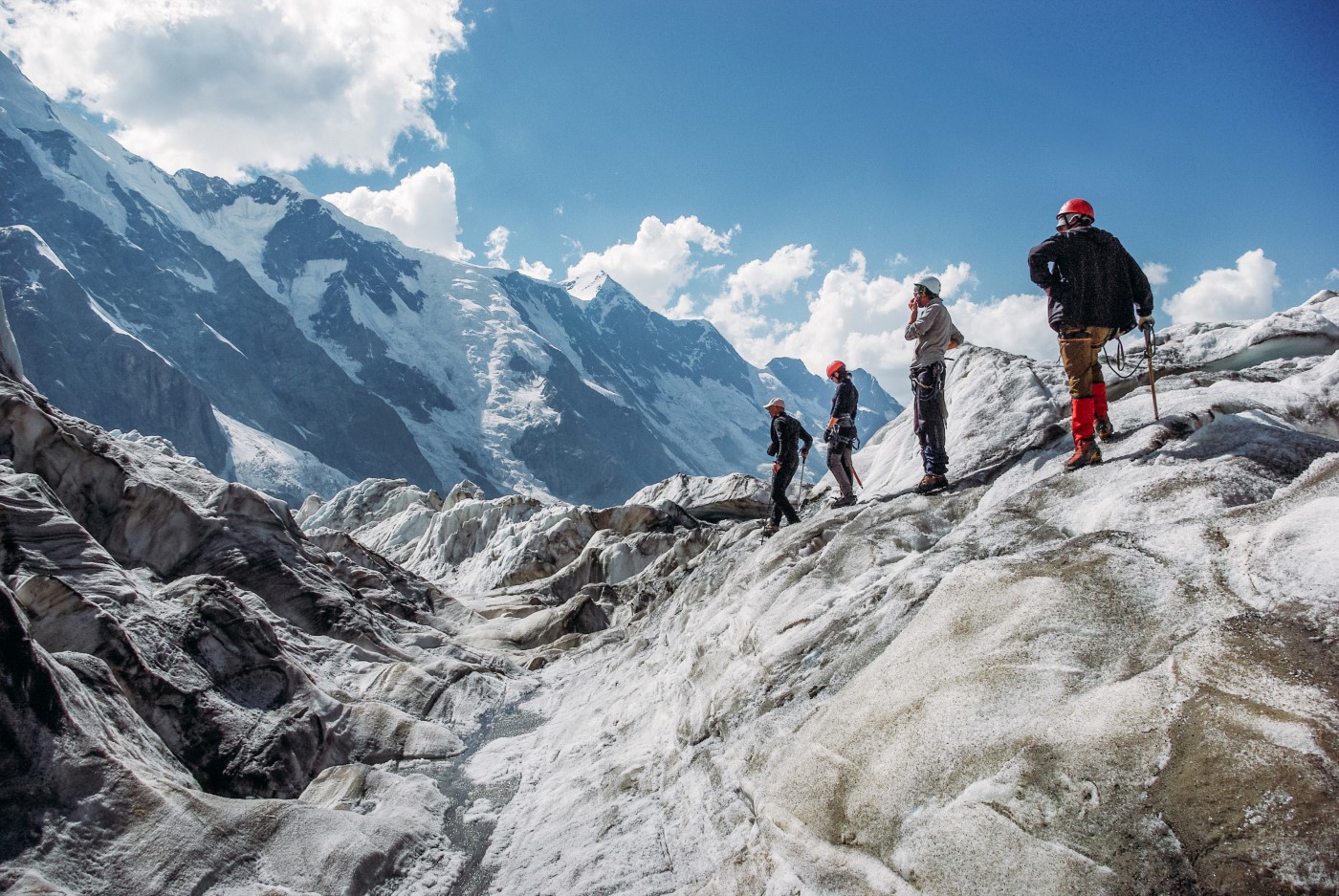 Climbers scaling an impressive mountain.